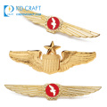 High quality custom metal zinc alloy embossed 3d gold plated pilot wings shape aviation airline badges for souvenir